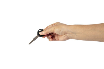 A black motorcycle key in a hand against a transparent background.