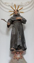 Wandcirkels plexiglas Jezus Christus SALZBURG, AUSTIRA - SEPTEMBER 8 2025:  The carved polychrome baroque statue of St. Francis of Assisi in the church Kollegienkirche by Josef Anton Pfaffinger or Meinrad Guggenbichler (1710–1720).  © Renáta Sedmáková