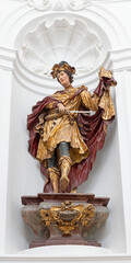 SALZBURG, AUSTIRA - SEPTEMBER 8 2025:  The carved polychrome baroque statue of St. Matin of Tours in the church Kollegienkirche by Josef Anton Pfaffinger (1710&ndash;1720).