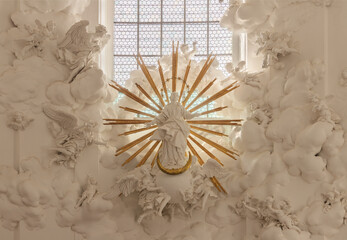 SALZBURG, AUSTIRA - SEPTEMBER 8 2025:  The statue of Immaculate Conception among the angels (stucco) in the church Kollegienkirche designed by J. B. Fischer von Erlach und made by D. F. Carlone. 