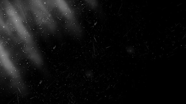 Black grunge texture overlay with light rays, scratches and dust for cinematic effect
