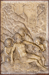 SALZBURG, AUSTIRA - SEPTEMBER 7, 2025: The relief of Pieta in the church of Benedictine Abbey Nonnberg by unknown artist.