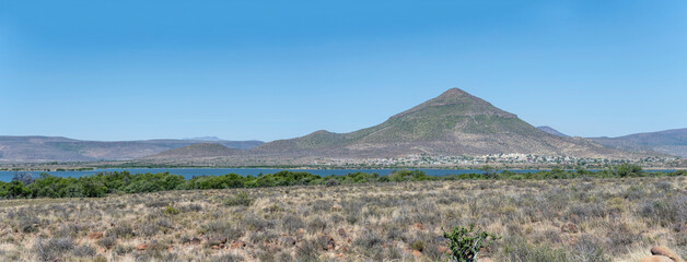 Nqweba Dam reservoir and Masizakhe district, near Graaff-Reinet, South Africa