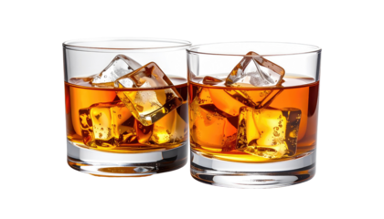 Two tumblers of brown liquor with ice cubes. The drinks are side-by-side against a stark black background