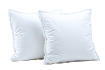 Two white square pillows isolated on transparent background are displayed
