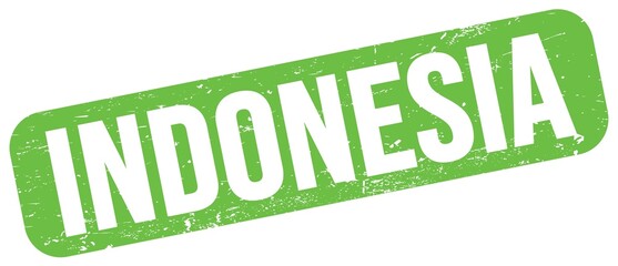 INDONESIA text on green grungy stamp sign.