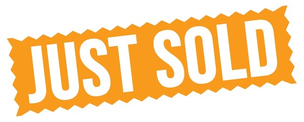 JUST SOLD text written on orange stamp sign.