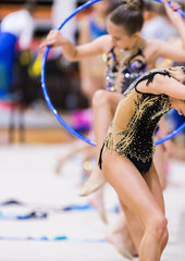 Athletes performing her hoop routine