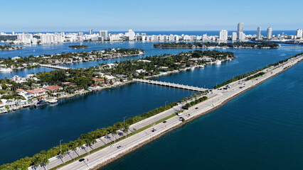 Fototapeta premium Miami Beach Skyline At Miami Beach In Florida United States. Urban Beach. Bay Water Scenery. Downtown City. Miami Beach Skyline In Florida United States. Peaceful Landscape.