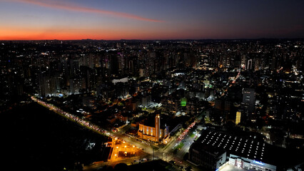 Obraz premium Sunset Catholic Church In Curitiba Parana Brazil. Breathtaking Aerial View Of Famous Church In The City. Building Landscape Skyscrapers Stunning. Industry Urban Corporate. Curitiba Parana.