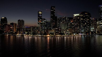 Fototapeta premium Brickell Bay At Miami In Florida United States. Illuminated City. City At Night Scenery. Downtown District. Brickell Bay At Miami In Florida United States. Amazing Cityscape.