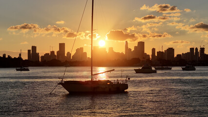 Sunset Bay At Miami Beach In Florida United States. Sunset City. Illuminated Cityscape. Downtown District. Sunset Bay At Miami Beach In Florida United States. Peaceful Sunset Sky.