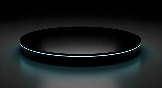 A sleek circular black platform with a subtle glowing blue ring around its edge presented in a dark studio setting