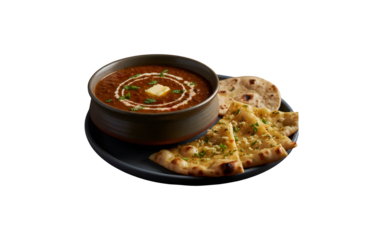 Dal makhani, also known as dal makhni, is a beloved dish from Punjab, India. It's made with whole black lentils, red kidney beans, butter, and cream.