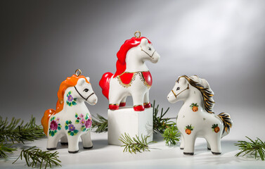 Porcelain Christmas tree decorations. Still life for the Year of the Horse