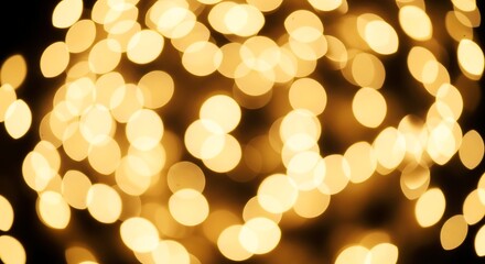 Soft focus background of warm golden bokeh lights creating a festive and celebratory atmosphere.