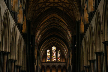Interior view of Salisbury Cathedral showcasing its stunning Gothic architecture and intricate...