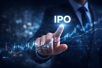 Businessman pointing at a glowing IPO text on a digital screen with a rising stock market chart.