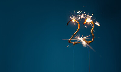 23 years celebration festive background with copy space made with Bengal fires in the form of number Twenty three.