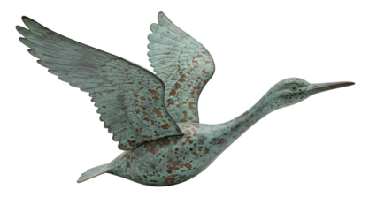 Weathered bronze bird sculpture in flight isolated on a transparent background patina