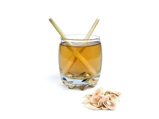 Lemongrass boiled water in glass with fresh lemongrass. Herbal drink for healthy lifestyle