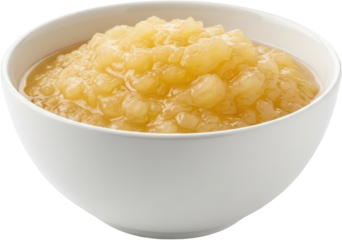 Chunks of textured cooked apples fill a simple white ceramic bowl showcasing a sweet fruit preserve isolate Applesauce Dessert Food Side dish Healthy Snack