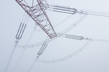 Electric cable wire in fog weather. Minimalism composition, distribution of power, simple industrial background