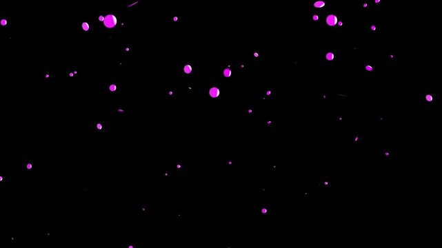 Falling pink dots on transparent background creates dreamy abstract background. Suitable for artistic, surreal, ethereal designs and ad campaigns.