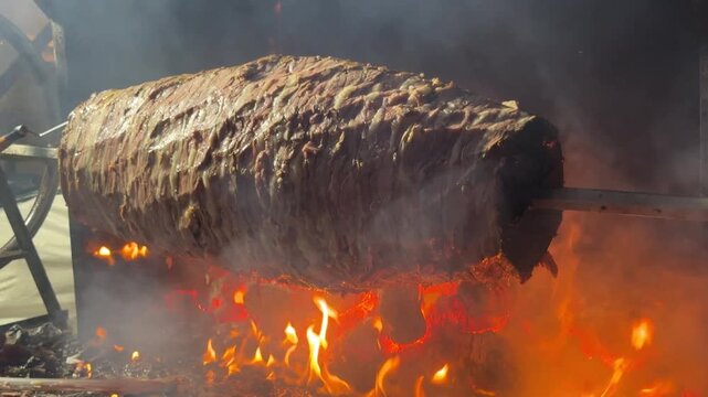 Doner Kebab Traditional Turkish Food Cag Kebabi. Rolling lamb meat doner kebab