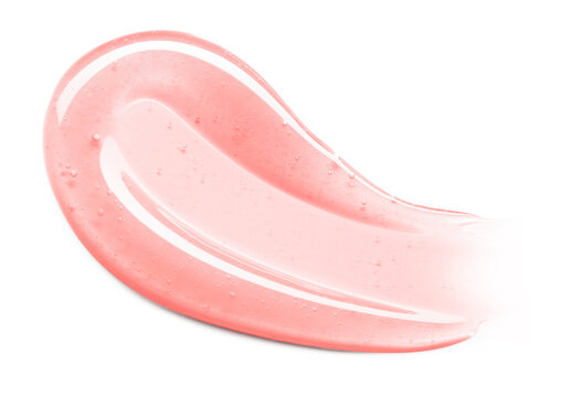 Pink lip gloss texture isolated on white background. Smudged cosmetic product smear. Makeup swatch product sample