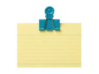 Isolated lined yellow note card with blue clip for office or school supply stationery item