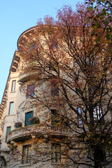 Old residential buildings along Via Pallavicino in Milan, Italy