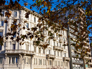 Old residential buildings along corso Sempione in Milan, Italy
