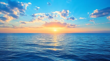 Obraz premium Serene ocean sunset with vibrant blue water and sky