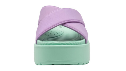 Isolated platform sandal with crossover straps in pastel colors on seamless backdrop