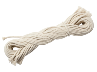 Isolated bundle of natural light rope, a looped hank is bound in the middle, lying across the frame