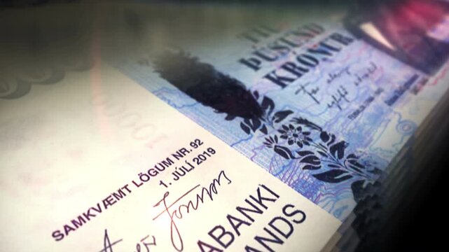 Iceland krona Icelandic money counting. 10000 ISK banknotes. Fast cash note count macro loop. Business, finance and economy. Loopable and seamless concept.