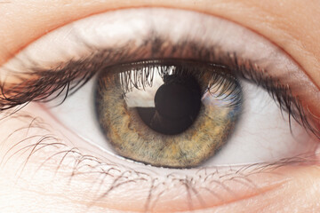 Close-Up Portrait of a Human Eye Featuring Unique Coloration, Captivating Detail, and Intricate Patterns Indicating Individuality and Depth of Perception