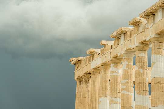 Ancient Greek architecture with dramatic sky
