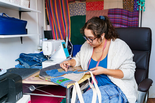 Chilean seamstress working in her creative studio