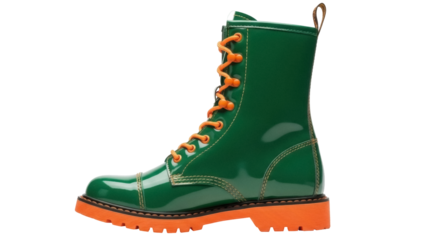 Isolated trendy shiny green ankle boot with bright orange laces and sole on seamless background