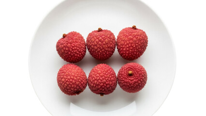 Isolated plate of fresh litchis, lychees, or Chinese berries, a healthy tropical fruit dessert