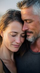 Fototapeta premium Couple leaning heads together emotional bond