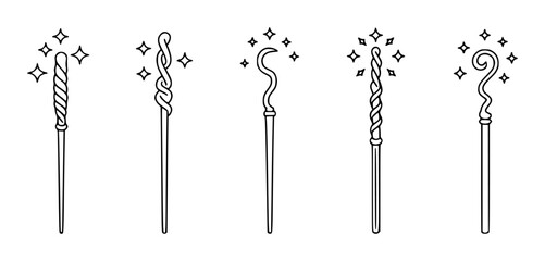 Black and white magic wands with sparkles outline © Lisa_Stock
