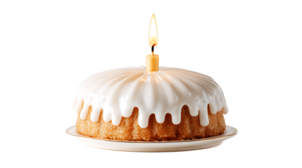 Bundt cake with white icing and lit candle on top