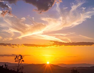 Majestic sunset over mountains with vibrant colors and cloud formations