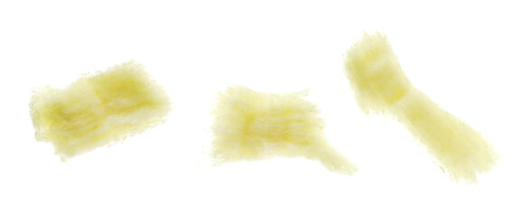 Yellow absorbent cotton wool pads flying, swabs, wadding isolated on white background and texture,...