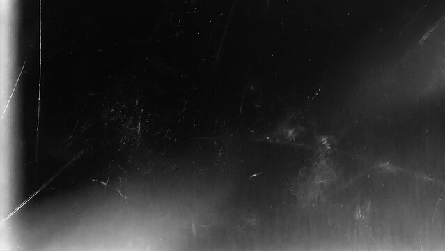 Dusty scratched scanned old film texture. Damaged grain. Overlay effect background image