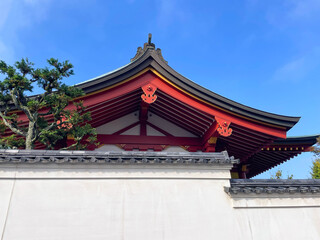 Traditional Japanese roof with blue sky