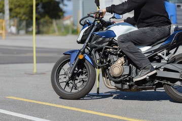 training in a motorcycle school, training in motorcycle control skills